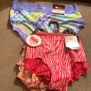4 pairs of medium undies- one hipster cut tie dye style and three cheeky cut